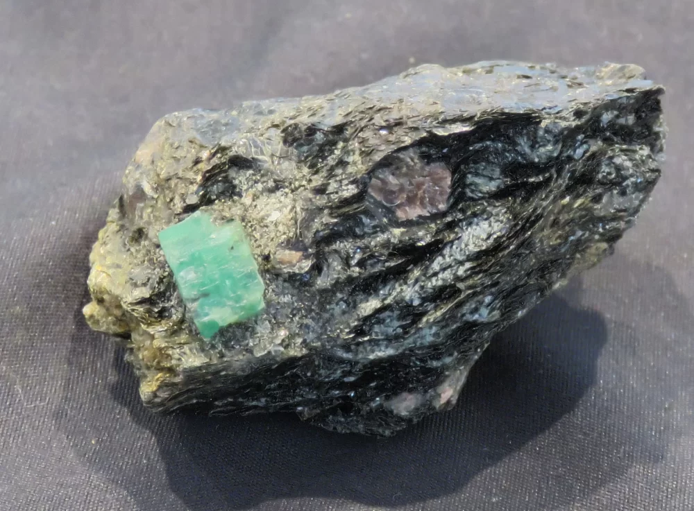 Emerald in biotite schist